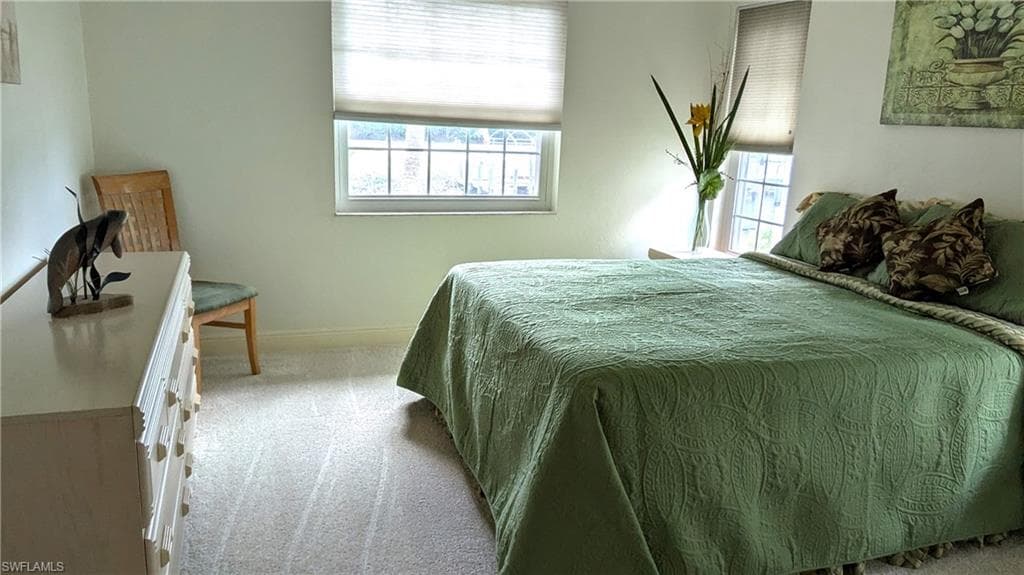 Guest Bedroom #2 Situated far from the Heart of the Home, this Quiet Guest Bedroom is Flooded with Natural Light and a Waterfront View