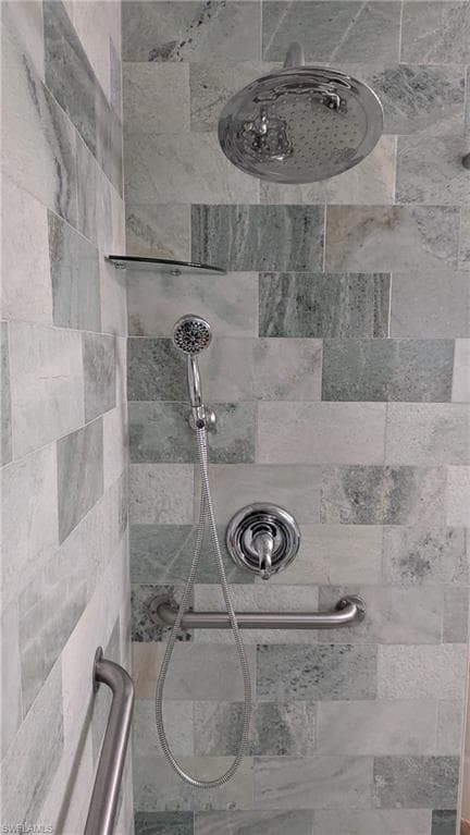 The Guest Bathroom Shower is a Soothing Waterfall Luxury Oasis.