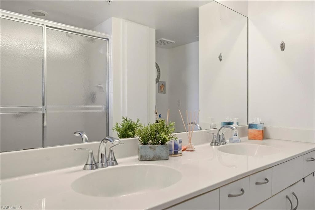 Primary bath with dual vanity and walk-in shower