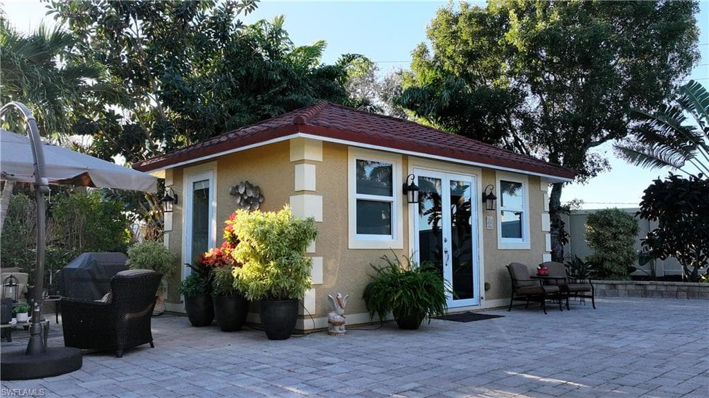 View of outbuilding with french doors