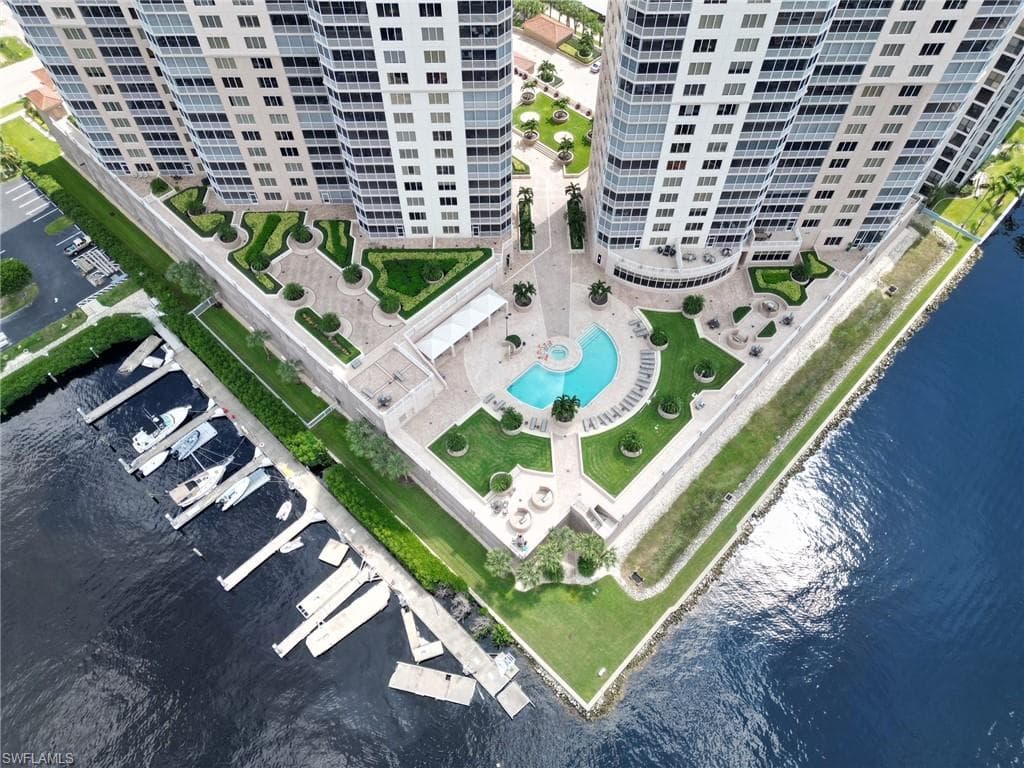 Bird's eye view of apartment complex / building and a large body of water