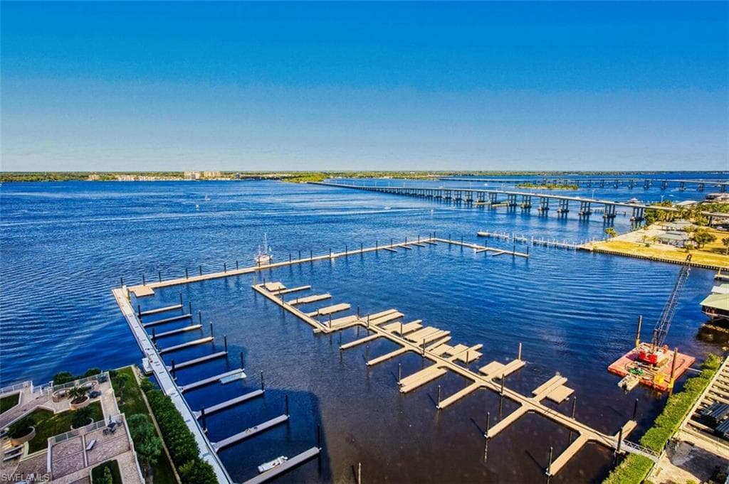 Bird's eye view of a notable bridge and a nearby body of water