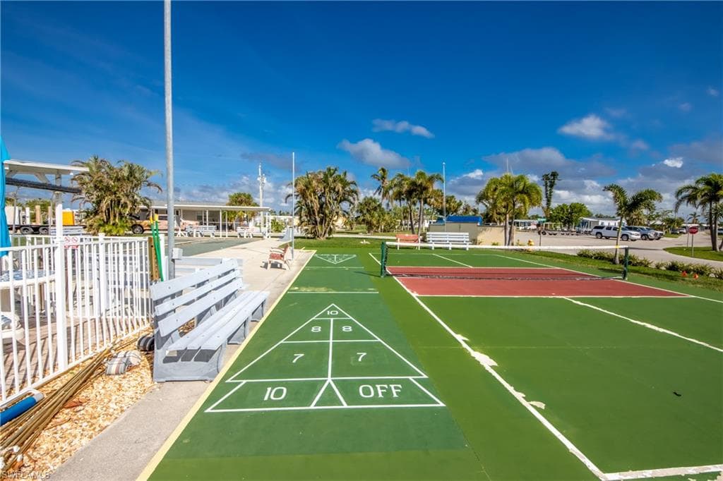 View of community featuring shuffleboard