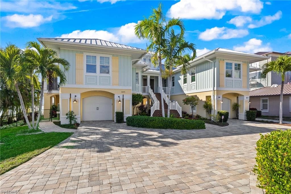 Four car garage - one is super extended to allow for boat/trailer parking - there is also an indoor elevator and a downstairs bathroom - the owners built this with meticulous details and no stone unturned!