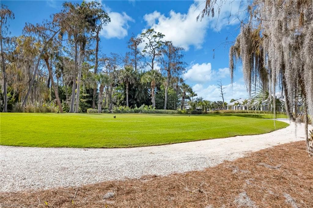 View of home's community featuring view of golf course