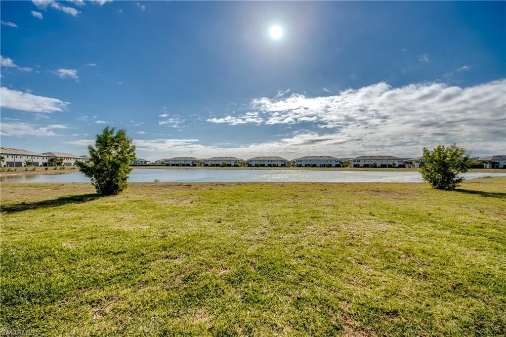 Water view featuring nearby suburban area