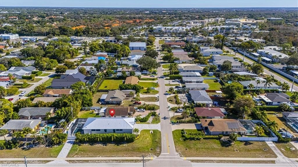 View of property location with nearby suburban area