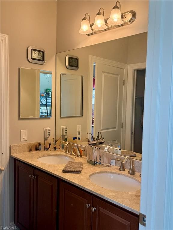Bathroom featuring double vanity