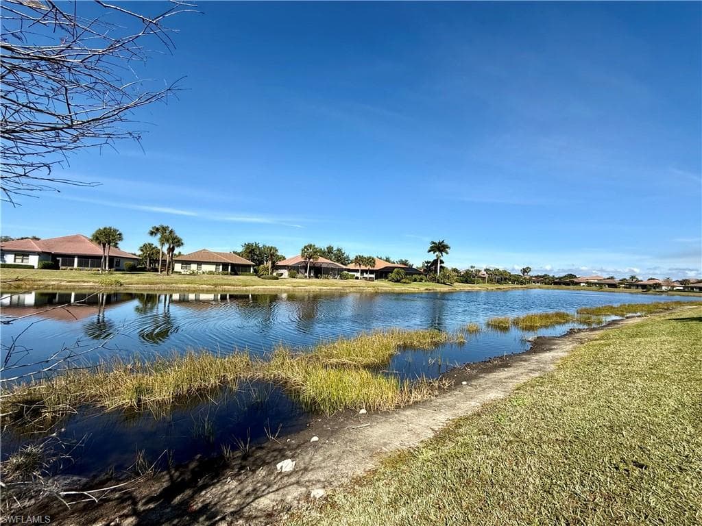Water view with nearby suburban area