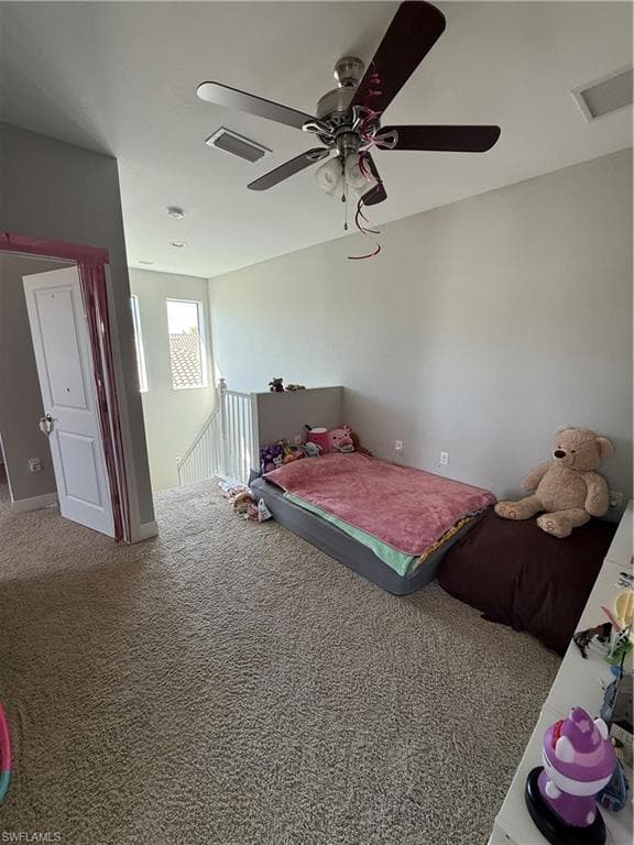 Bedroom with carpet floors and ceiling fan