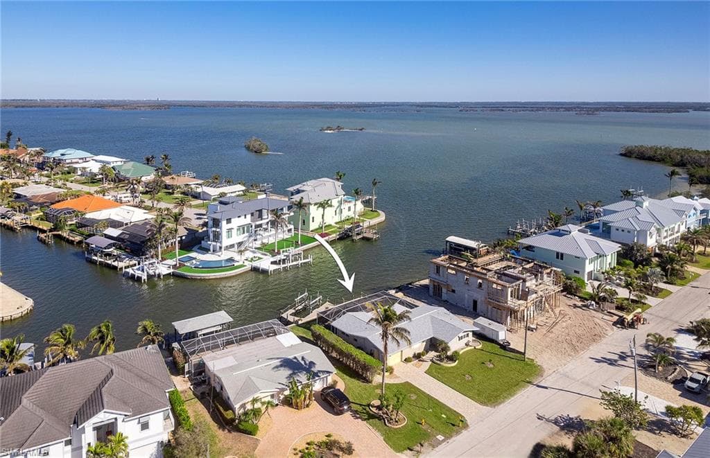 Drone / aerial view featuring Estero Bay