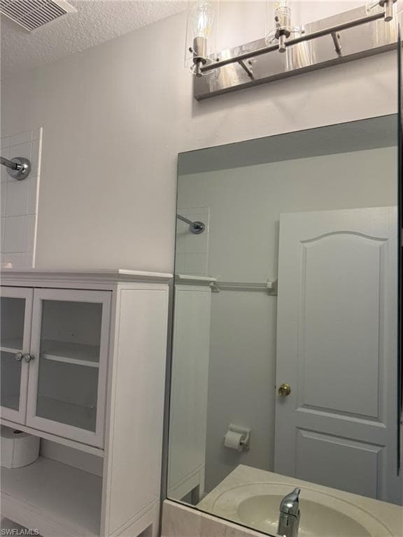 Bathroom 1 with Sink and New Light Fixture