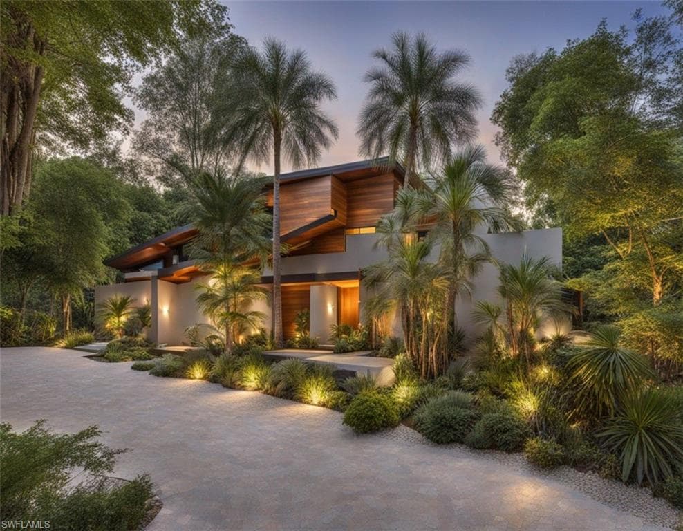 Digital RenderingContemporary house with stucco siding and driveway