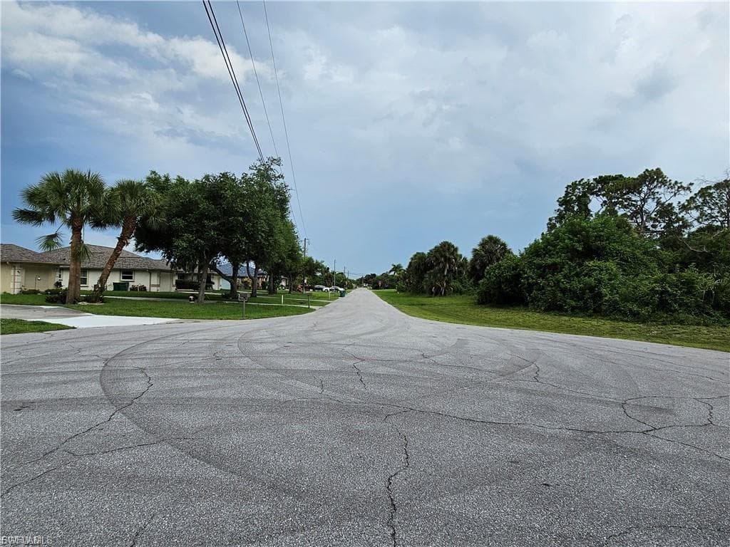 View of asphalt street looking away from property