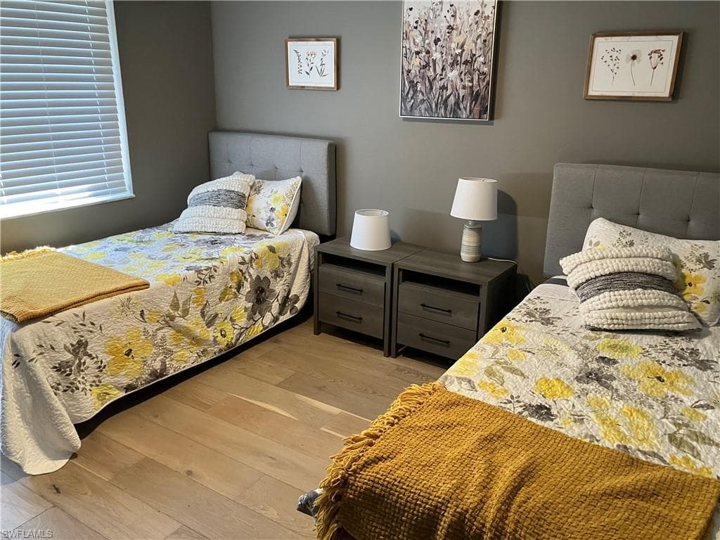 Bedroom featuring light wood-style flooring