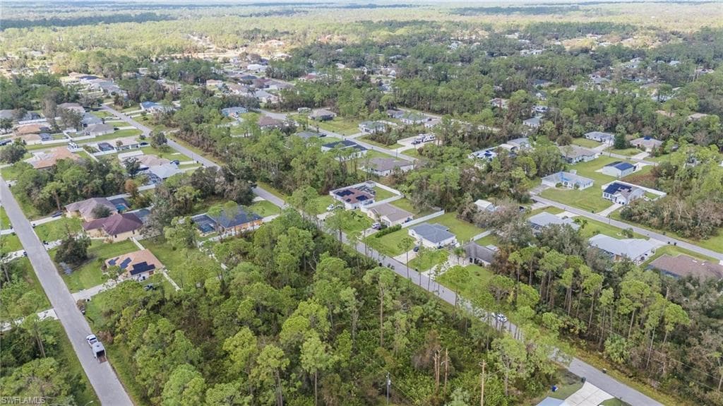 View of property location with nearby suburban area