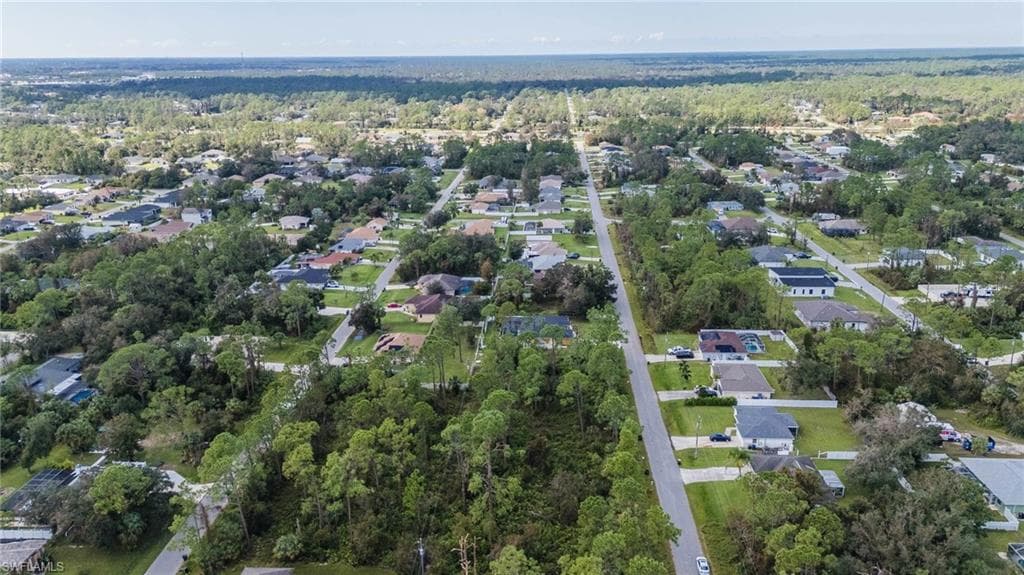 View of property location featuring nearby suburban area
