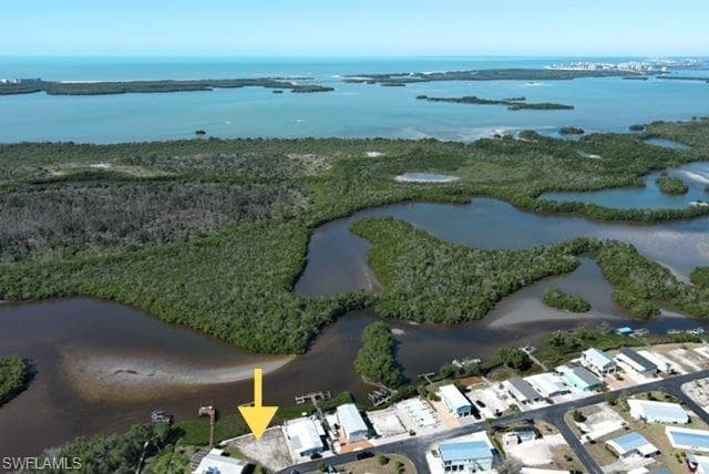 View of property location with a nearby body of water