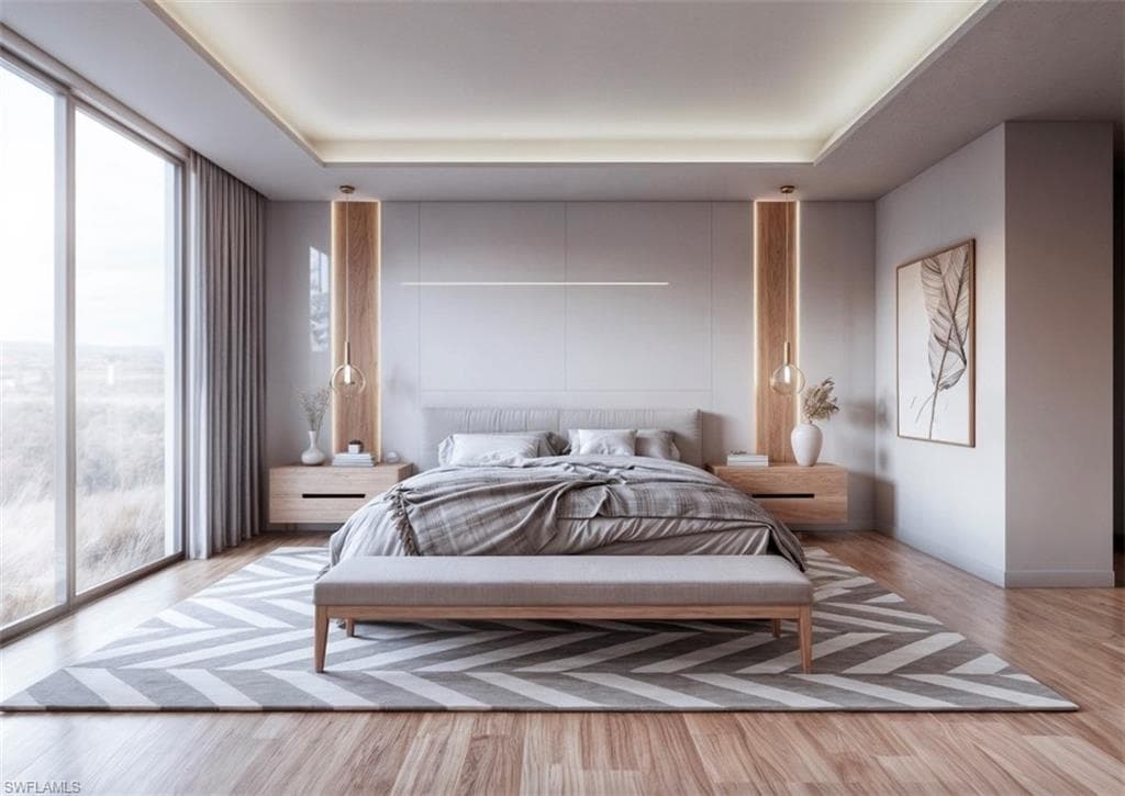 Bedroom with wood finished floors and a raised ceiling (Rendered photo)