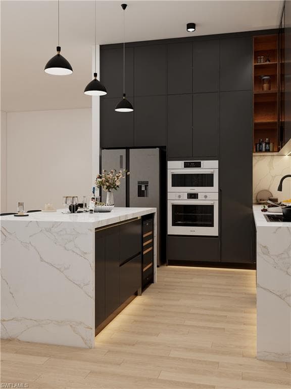 Kitchen featuring modern cabinets, dark cabinets, and hanging light fixtures (Rendered photo)