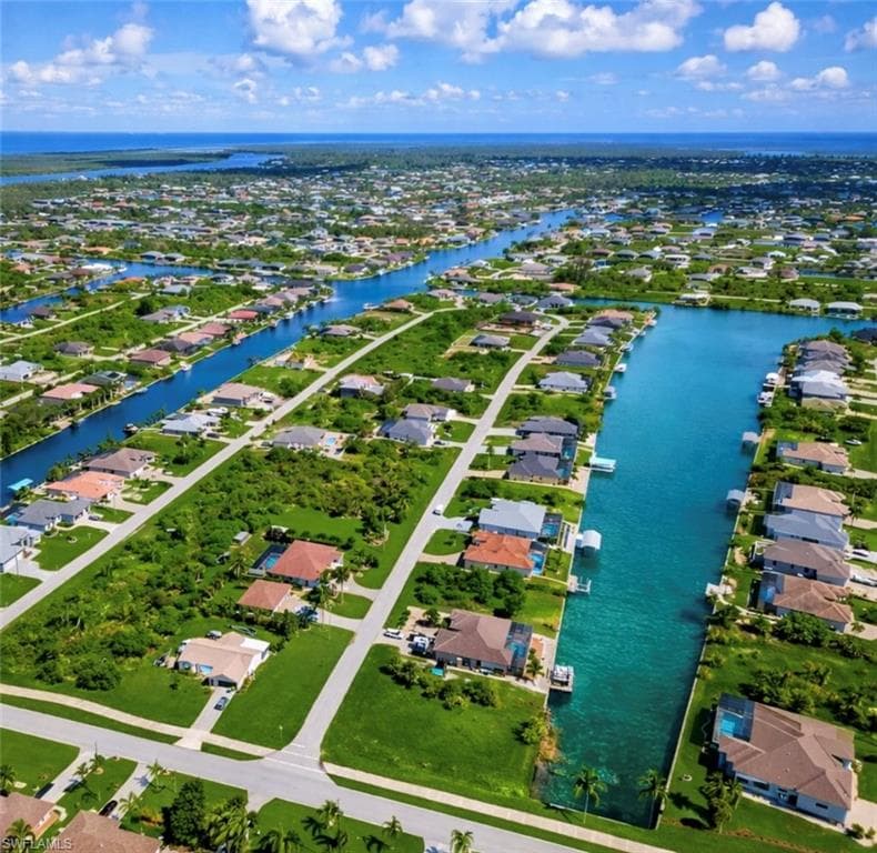 Aerial overview of property's location with nearby suburban area