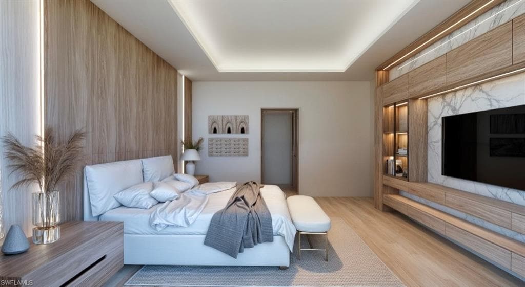 Bedroom with wood finished floors, a raised ceiling, and an accent wall (Rendered photo)