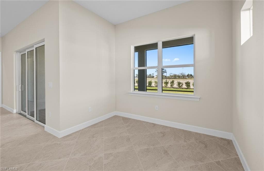Empty room with baseboards