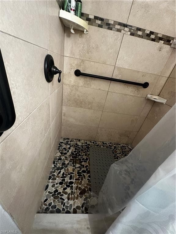 Full bath featuring a stall shower