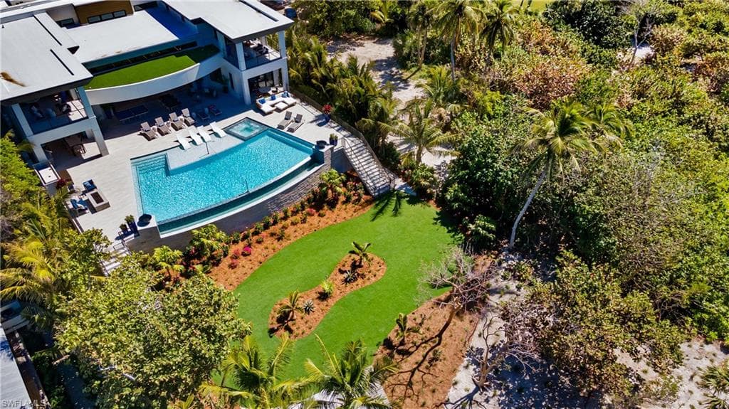 Over an acre of land, direct beach front property