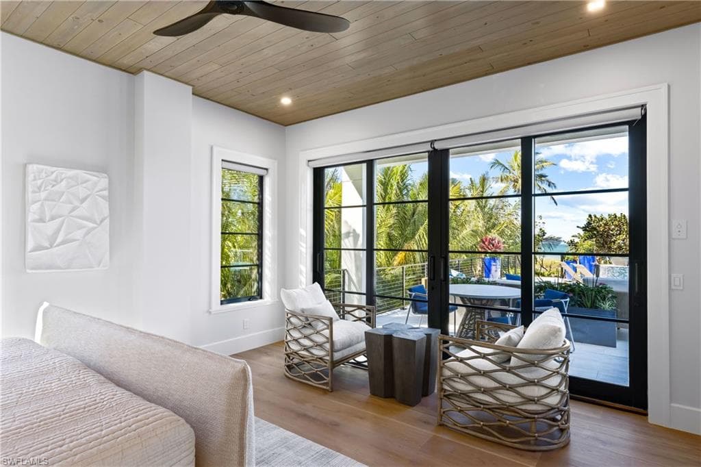 Primary bedroom seating area overlooking the Gulf waters