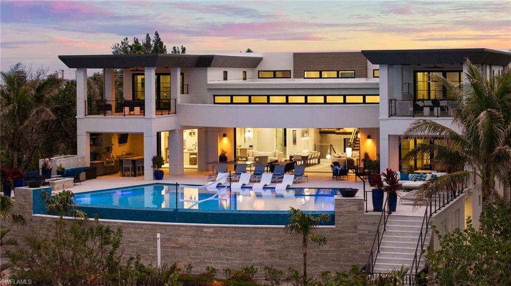 Elevated infinity edge pool extends the home to the outdoors