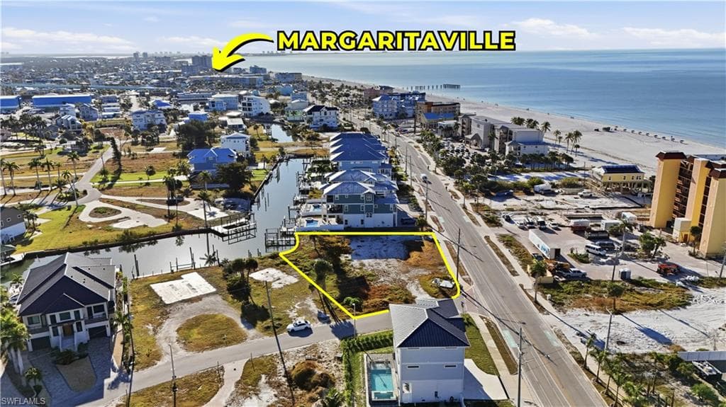Aerial perspective of suburban area with extended coastline