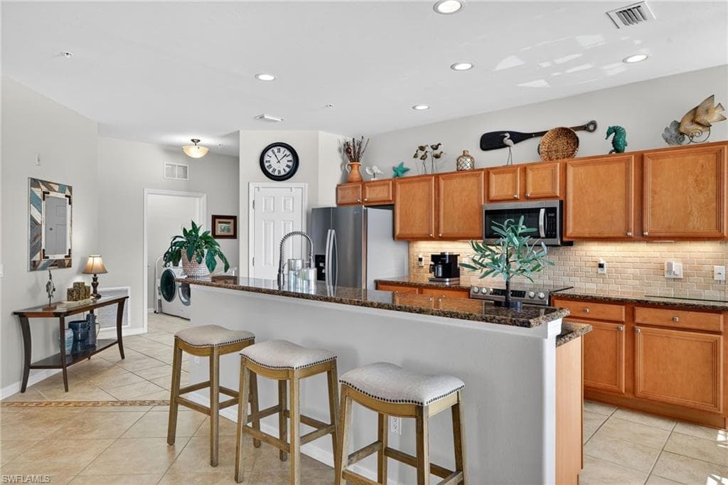 Thoughtfully designed kitchen to maximize cabinet and storage space.