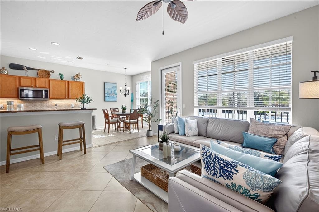Plenty of windows in the corner unit. Living room, dining room and breakfast bar all open and bright.