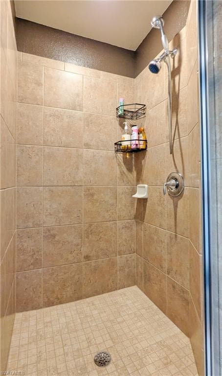 Full bath featuring a stall shower