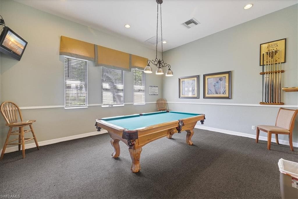 Game room with pool table and recessed lighting
