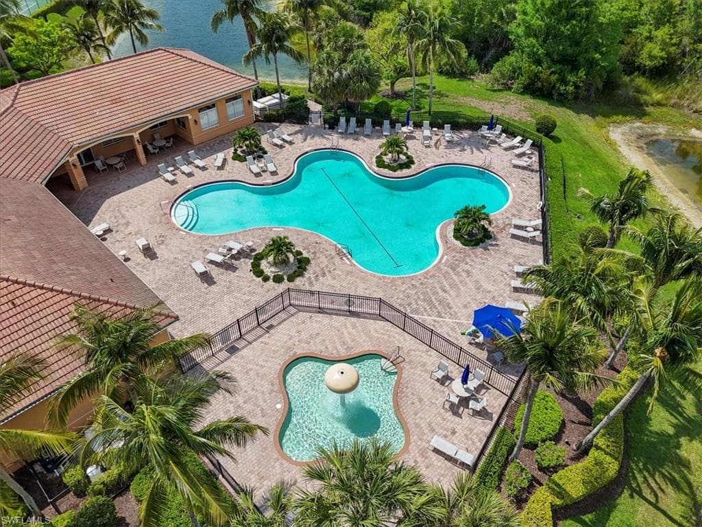 Community pool featuring a patio