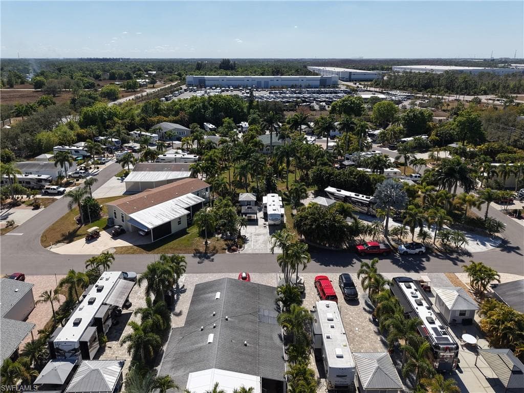 Aerial overview of property's location with nearby suburban area