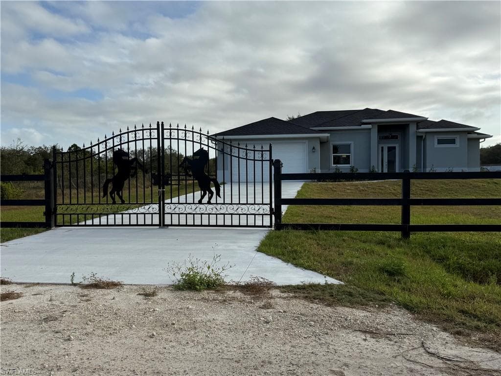 Gate with a fenced front yard