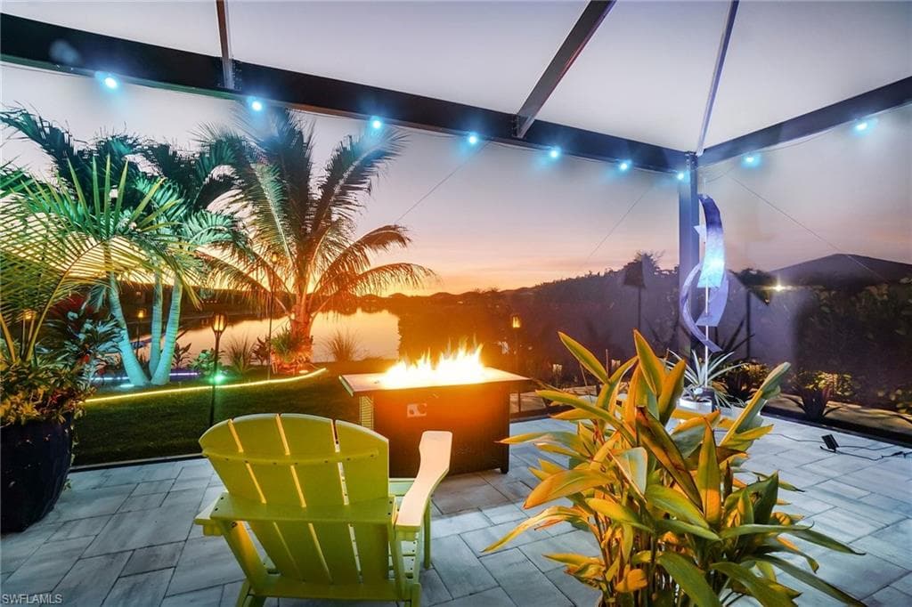 View of patio / terrace with a fire pit