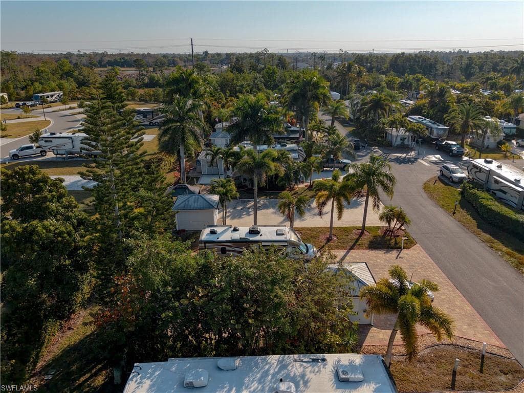 View of property location with nearby suburban area