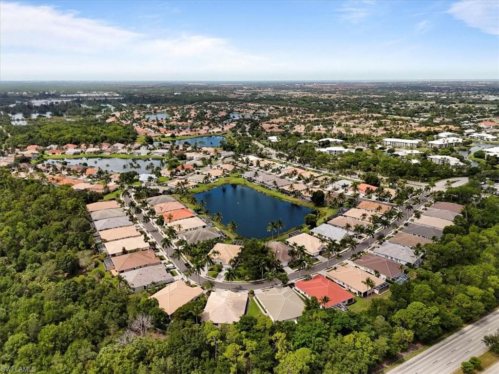 View of property location with nearby suburban area and a large body of water