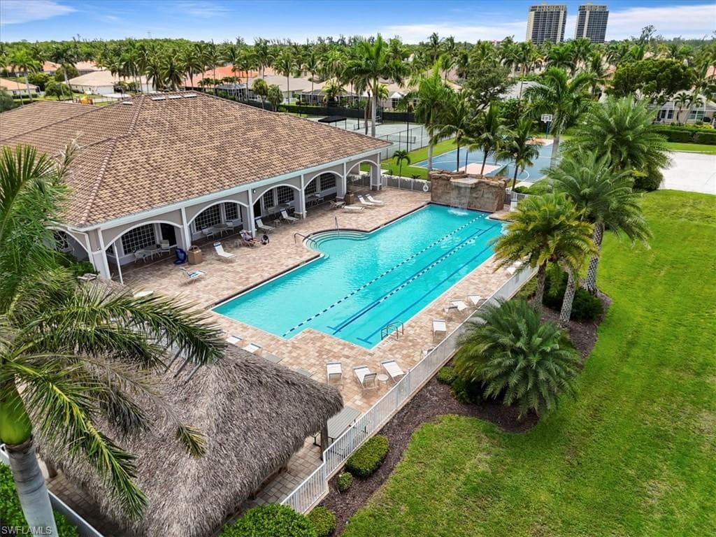 Community pool featuring a patio