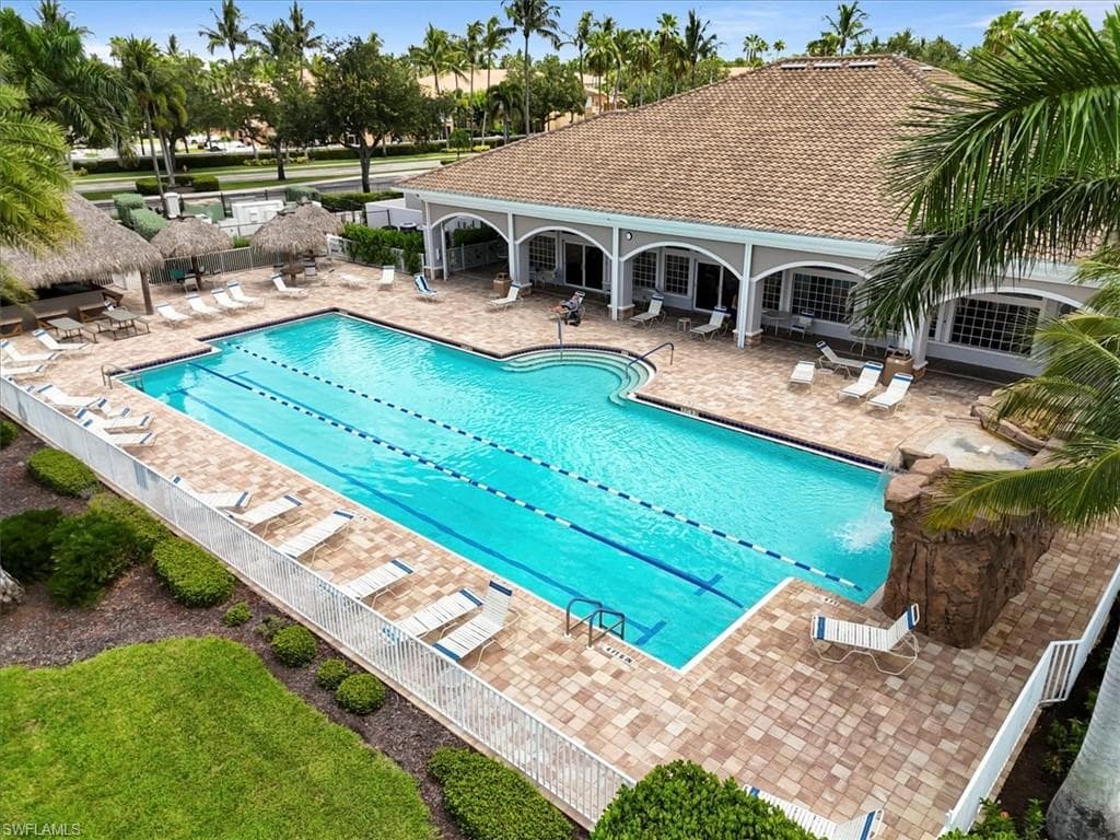 Community pool featuring a patio