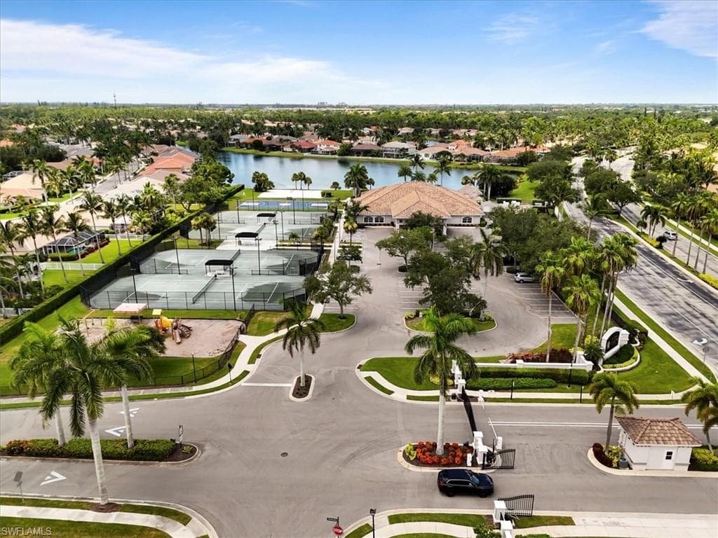 Aerial view of residential area with a nearby body of water