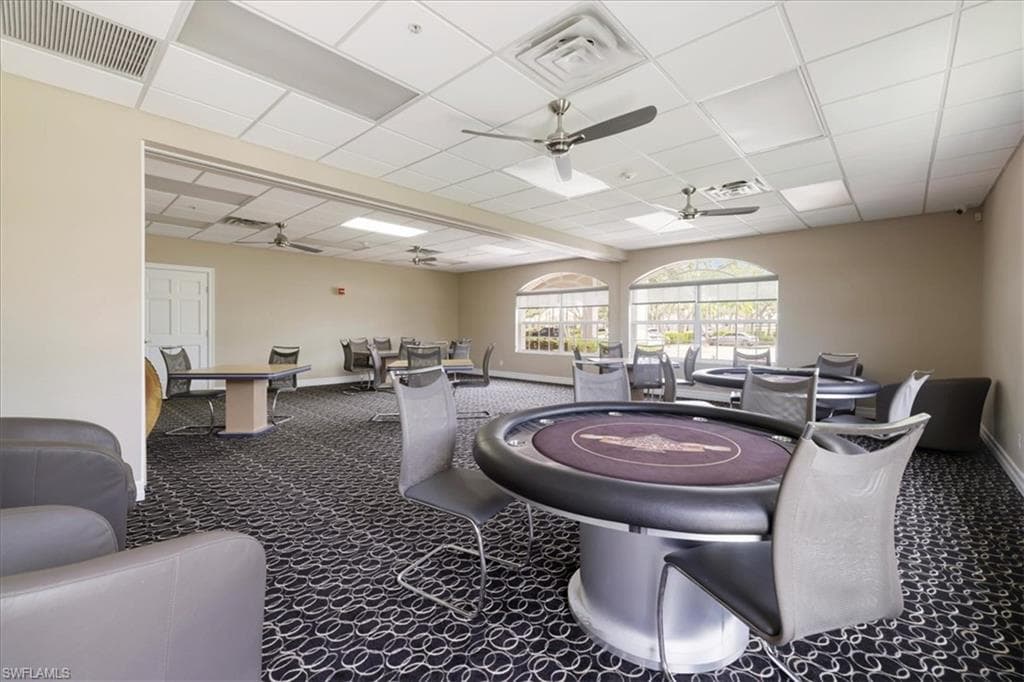 Recreation room with a drop ceiling