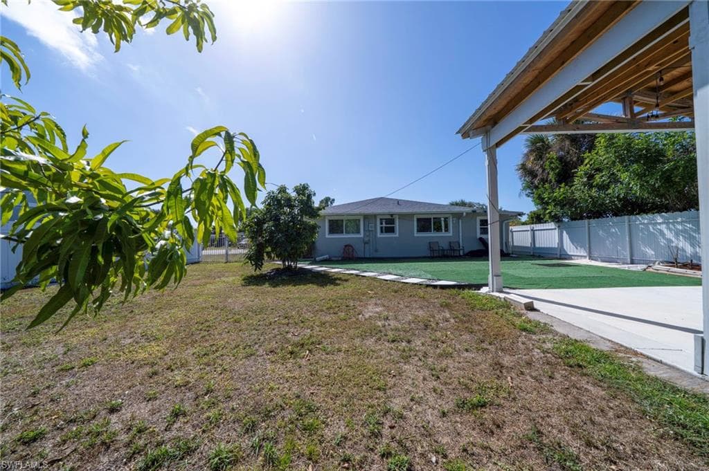 Fenced yard with a patio