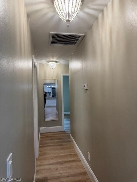 HALL TO KITCHEN FROM BACK BEDROOMS AND BATH
