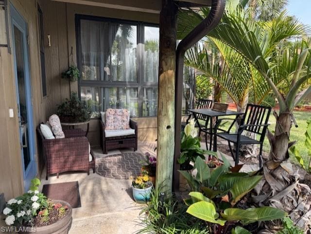 Main Side Entrance and patio/setting area