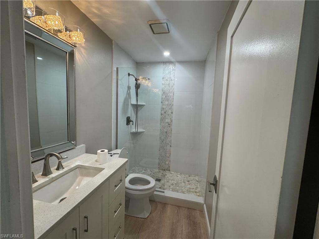 MASTER BATHROOM WALK IN SHOWER TALL GLASS GREAT LIGHT FIXTURES, SINK AND QUART COUNTER TOP